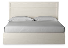 Stelsie King Panel Bed with Dresser, Mirror and Nightstand