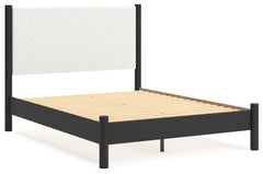 Cadmori Queen Upholstered Panel Bed