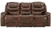 Brown leather recliner sofa with quilted pattern on a white background