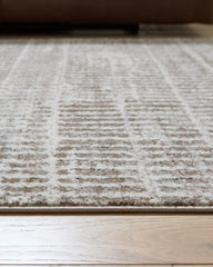 Fuadwick 5'3" x 7' Area Rug