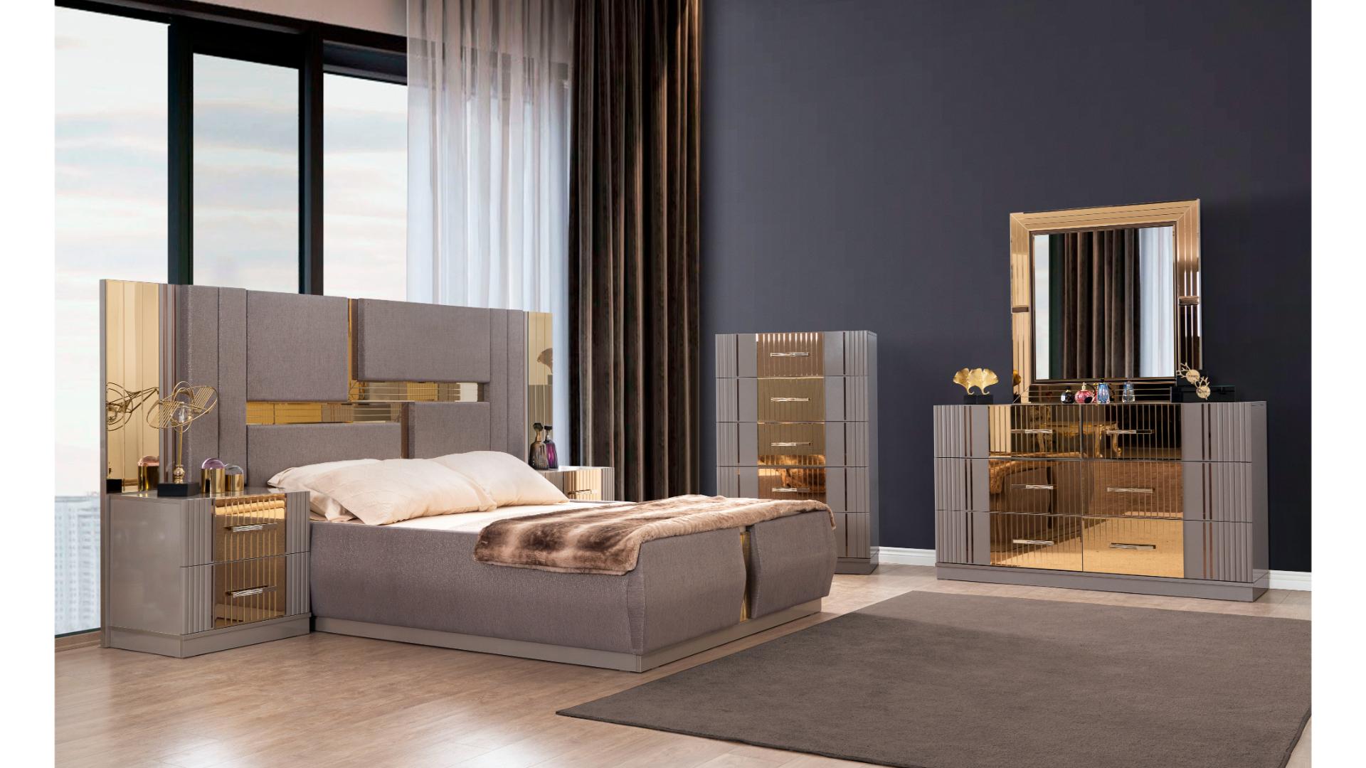 Modern bedroom set with bed, dresser, and mirror in a well-lit room.