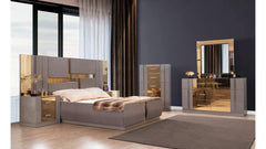 Modern bedroom set with bed, dresser, and mirror in a well-lit room.