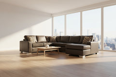 Brown leather sectional sofa with patterned cushions on a white background