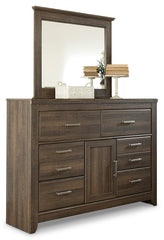 Juararo California King Poster Bed, Dresser, Mirror, Chest and 2 Nightstands
