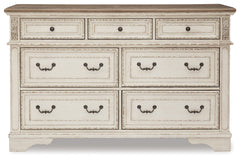 Realyn Queen Upholstery Panel Bed, Dresser, Chest, Nightstand, and Vanity Set