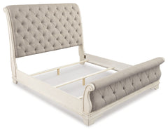 Realyn Queen Upholstered Sleigh Bed and Chest