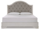 Brollyn King Upholstered Panel Bed