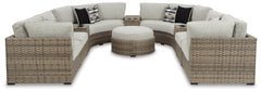 Calworth 8-Piece Outdoor Sectional with Ottoman