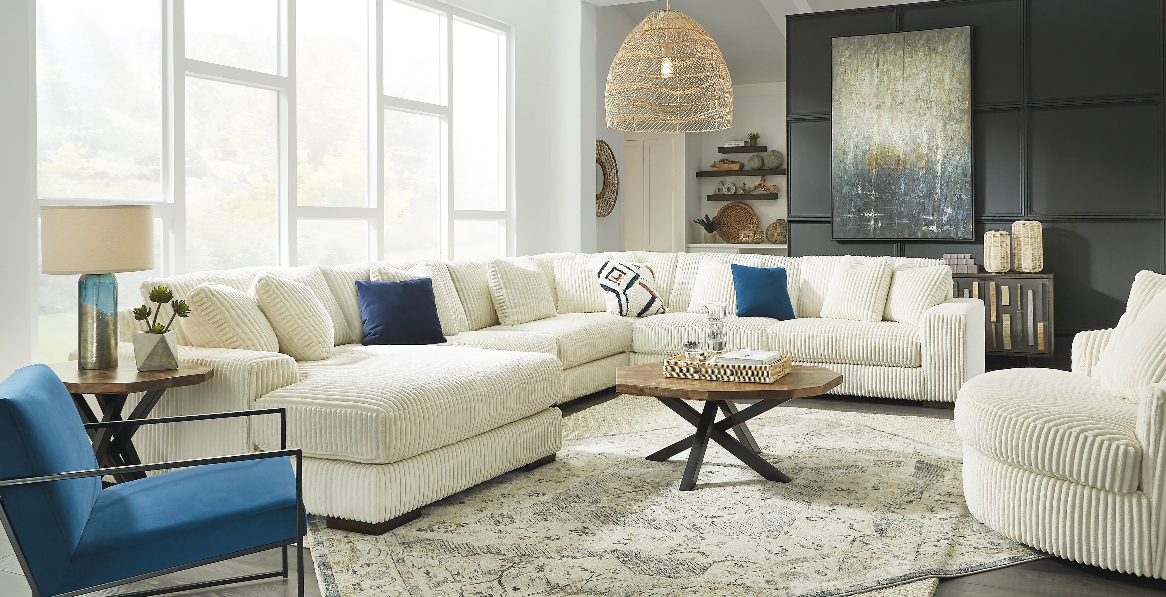 Luxurious Sectional Sofa Collection in a modern living room, available at Home Style Furniture Stores in Kitchener, Stoney Creek and Whitby.